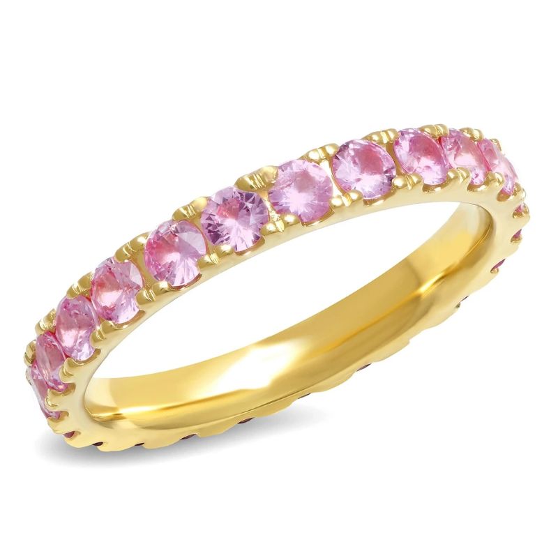 Comfortable, feminine, and flirty - the Large Pink Sapphire Eternity Band is the perfect treat-yourself present. It looks beautiful on its own, or next to the Large Ruby Eternity Band and consistently sells out every year before Valentine's Day. The ring weighs 1.75 carats and is 2.88 mm thick.