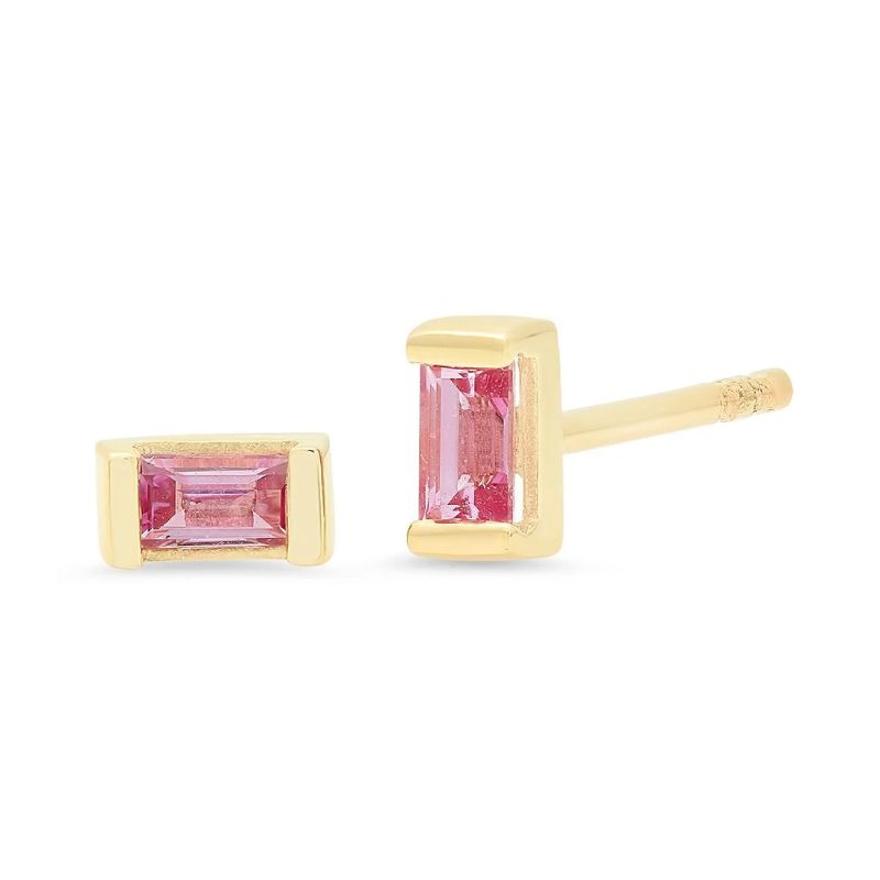I've been searching for these studs all my life. The Pink Sapphire Baguette Studs are made up of 0.22 carats worth of channel-set pink sapphires and fill the need of that not-too-big and not-too-small baguette stud shape that looks great laid horizontally or vertically on the lobe. They can be dressed up or down, and can be worn in any of your ear holes. They look amazing next to our Mini Pink Sapphire Huggies, or on their own. These Eriness earrings are not to be missed.
