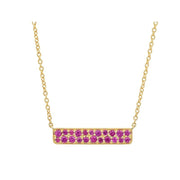Our Ruby Staple Necklace is made up of 0.40 carats of rubies situated in a uniform manor to create a simple two-row horizontal bar. This is a favorite Eriness necklace to sport everyday, as it's casual meets cool and classy in a timeless shape, with just the right amount of color. We love to see it layered with our Solitaire Ruby Lariat. The length is ideal, as it can be worn at 16, 17 and 18.