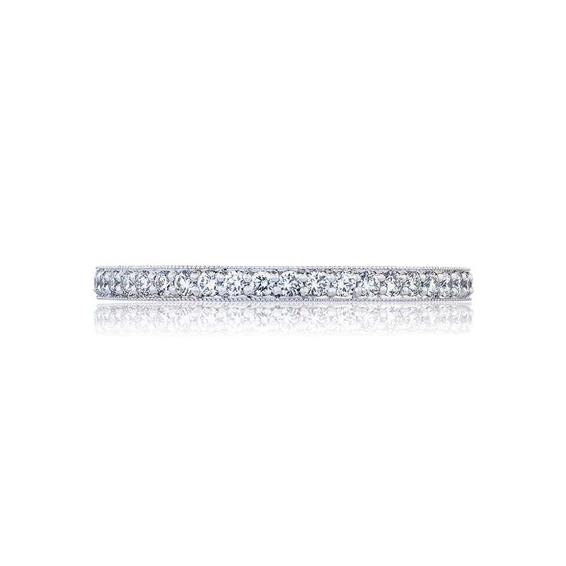 Simplicity and elegance unite in this classic diamond band with hand set pav? diamonds. Worn with any Tacori diamond engagement ring or stacked on as a fashion piece; youll never want to take it off. 