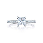 The clean look of channel set princess cut diamonds and regal floating crescent designs makes this princess setting fit for a queen.This engagement ring can accommodate a variety of center diamond sizes; starting at 0.5 carats