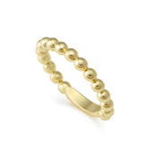 A wonderful stacking ring with Caviar beading in 18K gold. Ideal to pair with other gold designs.18K GoldBand Width 3mmStyle #: 03-10182-7