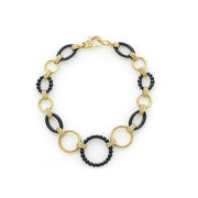 A classic bracelet with 18K gold and black ceramic round, oval and beaded links. Finished with a lobster clasp. Ideal to layer with other Caviar Gold designs.- 18K Gold- Signature Lobster Clasp- STYLE #: 05-10340-CB7