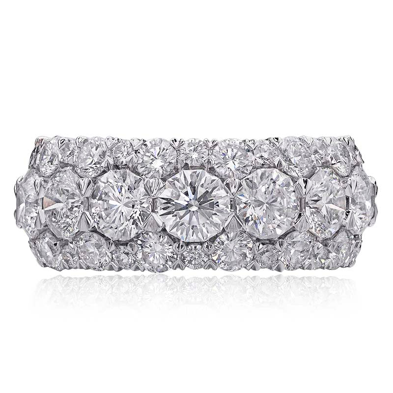 Christopher Designs band with 2.43cttw. Crisscut round diamonds surrounded by 1.09cttw round cut diamonds set in 18K white gold.