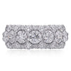 Christopher Designs band with 2.43cttw. Crisscut round diamonds surrounded by 1.09cttw round cut diamonds set in 18K white gold.