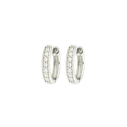 The Small Diamond Huggie Hoop Earrings feature sparkling round diamonds pave set in 18K white gold.Gemstone	White DiamondMetal	18K White GoldWeight	0.11ctwLength	12 mmAlso available in 18k yellow gold and rose gold.