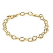 Fluted links of 18K gold form this classic bracelet. Finished with an 18K gold signature lobster clasp.