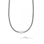 A freshwater cultured pearl station with Caviar beading in 18K gold and sterling silver on this 16 inch necklace. Finished with a signature lobster clasp detailing the LAGOS crest in 18K gold.- Sterling Silver & 18K Gold- Width 3mm- Length 16 Inches- Pearl measures 9mm- STYLE #: 04-80969-M18