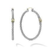 Signature sterling silver Caviar beads accented by an 18K gold x station on these hoop earrings. Finished with 14K gold posts.Sterling Silver0.07 CaratLocking WireDimensions 35mm x 4mmStyle #: 01-81025-00