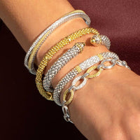 LAGOS CAVIAR 18K YELLOW GOLD & STERLING SILVER HINGED BANGLE