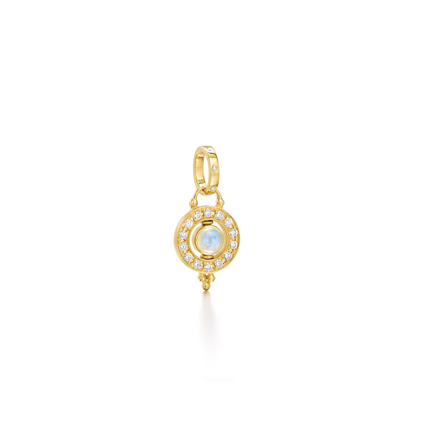 On the 18K Mini Orbit Pendant, a halo of diamonds encircles a luminous Royal Blue Moonstone center. Though it's the smallest star in our constellation of Celestial gems, this pendant shines no less brightly. Otherworldly when paired with your favorite pieces, the 18K Mini Orbit Pendant also makes a striking statement all on its own.18K Gold0.3cts of Blue Moonstone0.285cts of DiamondsLength: 27.17mm/1.07;Width: 14.72mm/0.5