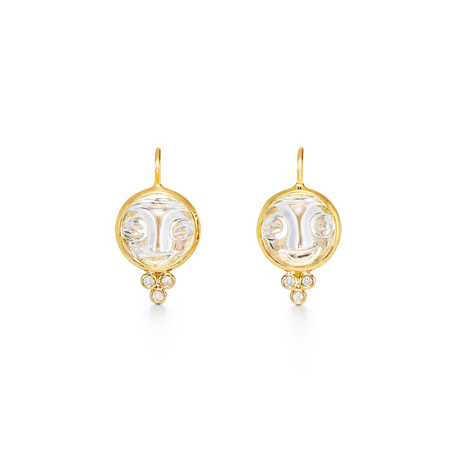 Two happy rock crystal moonfaces smile in a halo made of 18 karat gold. Featuring a trio of diamonds, the 18K Moonface Earrings are out of this world. One of Temple St. Clairs best sellers!18K GoldHinge BackNatural Rock Crystal0.09cts of Diamonds