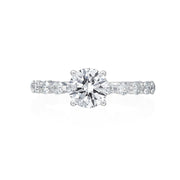 This Moyer Collection engagement ring was designed for a wearer with unique tastes! The small round brilliant diamonds, which add up to 0.65ctw diamonds, scattered down the shank give this ring a geometric twist. A round brilliant center diamond sits atop of this ring. Center stone not included in price. 