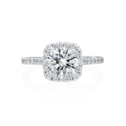 This Moyer Collection engagement ring was designed to give the perception of a cushion cut with the shape of the halo even though the center stone is round brilliant. Diamonds can be seen from every angle of this ring in the halo, shank, and under the head. Center stone not included in the price. 