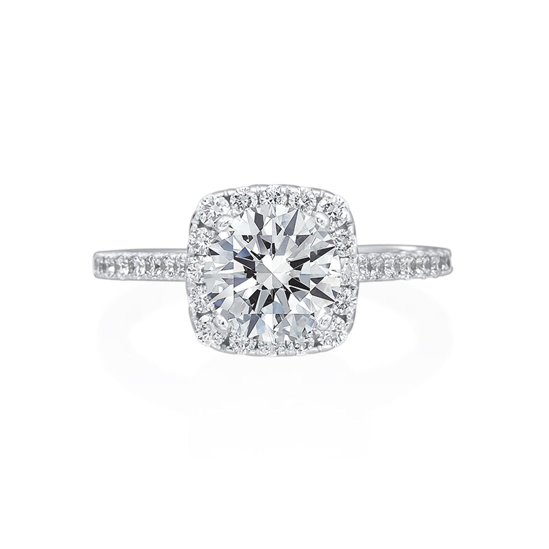 This Moyer Collection engagement ring was designed to give the perception of a cushion cut with the shape of the halo even though the center stone is round brilliant. Diamonds can be seen from every angle of this ring in the halo, shank, and under the head. Center stone not included in the price. 