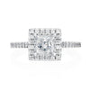 Complete with a sizable round brilliant diamond halo, this 14K White Gold engagement ring packs a big diamond look. A Princess cut center diamond sits comfortably inside the halo. Small round brilliant diamonds travel 3/4 way around the shank of this engagement ring. Center stone not included in price. 