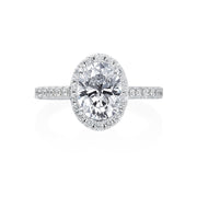 Beautiful white diamonds glisten from every angle of this sophisticated engagement ring. Throughout the ring, 0.86ctw round brilliant diamonds are visible from the halo, shank and underneath the head of this engagement ring. The oval center stone commands attention in this engagement ring setting. Center stone not included in pricing. 