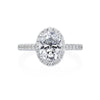 Beautiful white diamonds glisten from every angle of this sophisticated engagement ring. Throughout the ring, 0.86ctw round brilliant diamonds are visible from the halo, shank and underneath the head of this engagement ring. The oval center stone commands attention in this engagement ring setting. Center stone not included in pricing. 