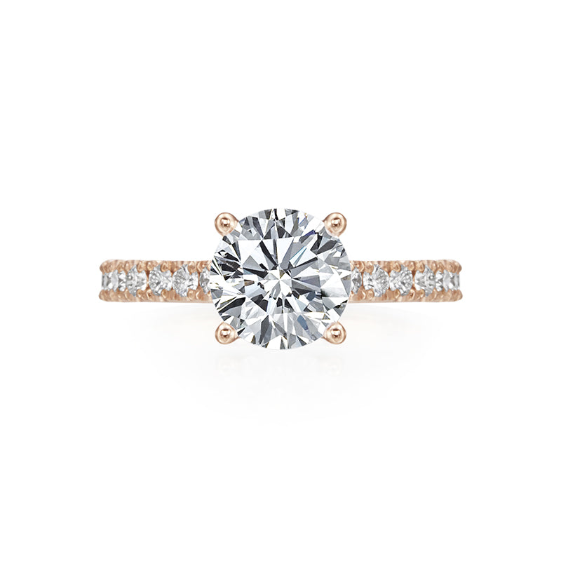Simple and sophisticated with a lot of sparkle! This 14K Rose Gold Semi-Mount is adorned with diamonds 3/4 way around the shank of the ring. Center stone is not included in the price. 