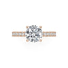 Simple and sophisticated with a lot of sparkle! This 14K Rose Gold Semi-Mount is adorned with diamonds 3/4 way around the shank of the ring. Center stone is not included in the price. 
