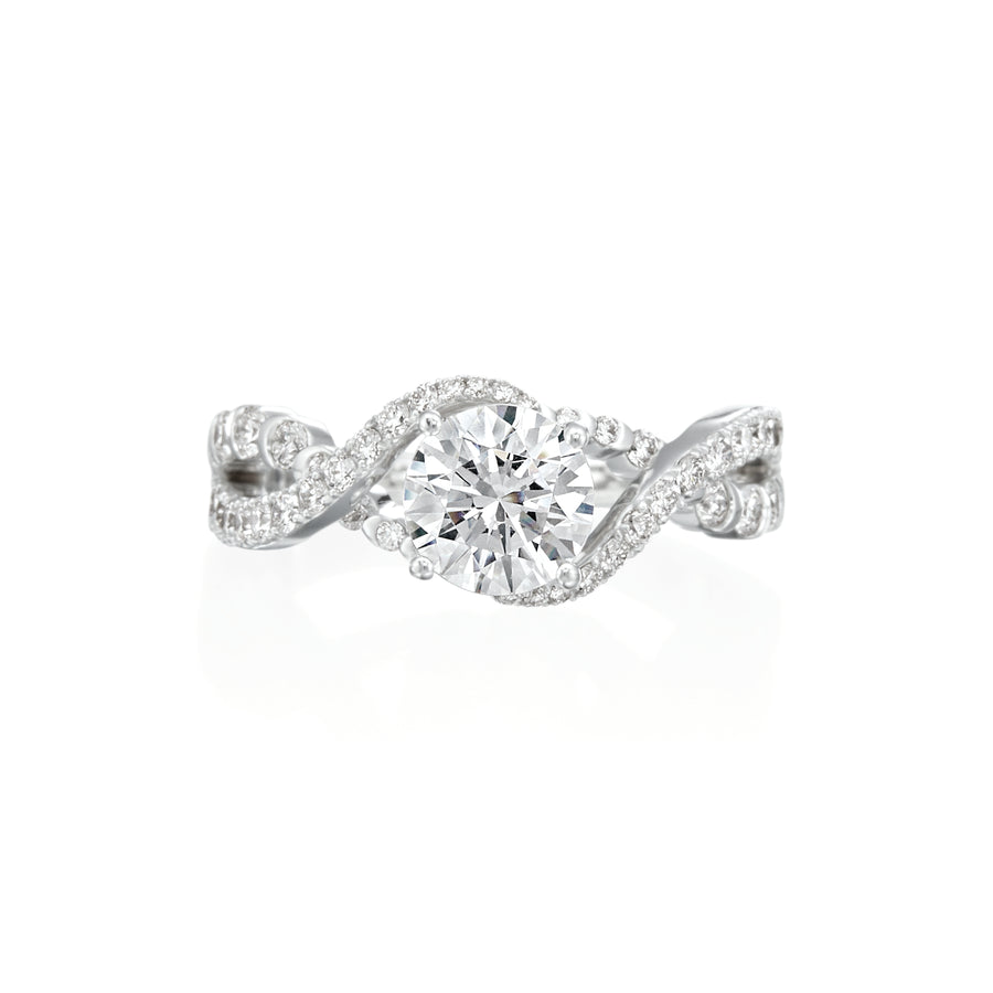 One of the Moyer Collections most unique, dynamic designs, this engagement ring features a swirl, criss cross design with graduated diamond patterns featuring prong set diamonds and bezel set diamonds. In this design, there are 0.71ctw diamonds that are G-H in color, SI1-2 in clarity. Inside the shank, there is a small blue sapphire and the Moyer logo, a signature feature on all Moyer Collection engagement rings. Center stone is not included in price. This ring can be custom made to fit any size