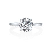 Jack Kelege makes the most beautiful solitaire engagement rings that have gorgeous hidden details for the wearer to enjoy. From the side profile, the wearer gets a glimpse of the hidden diamond bezel halo underneath the head of the mounting. On the shank of the mounting are beautiful etched carvings and intricate milgrain detail.  Center diamond is not included in the price shown. 