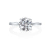 Jack Kelege makes the most beautiful solitaire engagement rings that have gorgeous hidden details for the wearer to enjoy. From the side profile, the wearer gets a glimpse of the hidden diamond bezel halo underneath the head of the mounting. On the shank of the mounting are beautiful etched carvings and intricate milgrain detail.  Center diamond is not included in the price shown. 