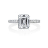 Jack Kelege makes the most beautiful engagement rings that have gorgeous hidden details for the wearer to enjoy. From the top, the wearer sees a beautiful emerald cut diamond with small round brilliant diamonds traveling half way around the shank. From the side profile, the wearer gets a glimpse of the beautiful etched carvings and intricate milgrain detail.  Center diamond is not included in the price shown. 