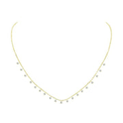 This fashionable 18K yellow gold diamond necklace features 19 individual round brilliant diamonds of F-G color, VS-I Clarity. 
