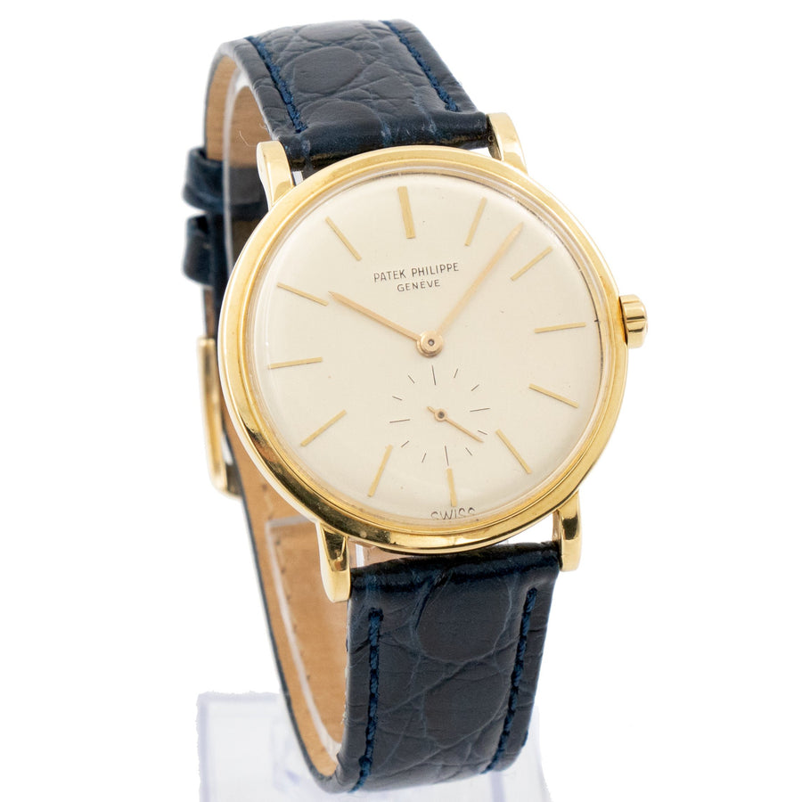 This beautiful Patek Philippe features an 18k yellow gold case, a champagne dial and is presented on a blue alligator strap. Its powered by a manual wind movement and keeps excellent time. The watch came to our store as a trade and does not come with box or papers. Please let us know if you have any questions about this amazing vintage Patek Philippe timepiece.
