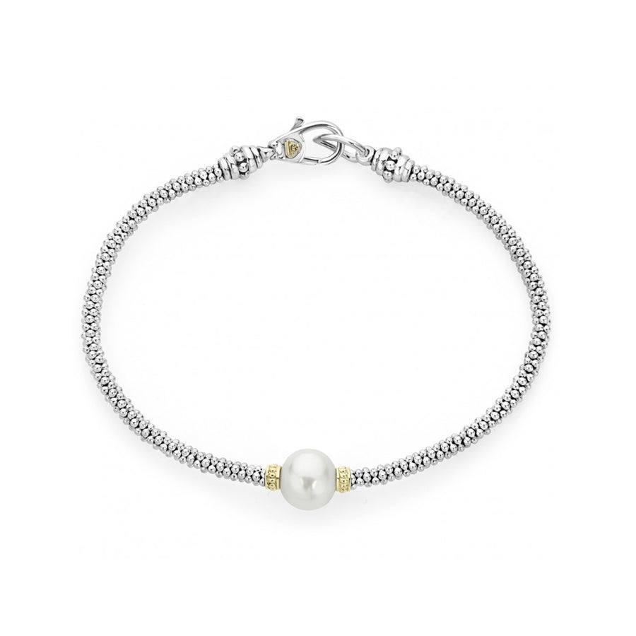 A freshwater cultured pearl station with Caviar beading in 18K gold and sterling silver on this versatile bracelet. Finished with a signature lobster clasp detailing the LAGOS crest in 18K gold.- Sterling Silver & 18K Gold- Signature Lobster Clasp- Width 3mm- Pearl measures 9mm- STYLE #: 05-81171