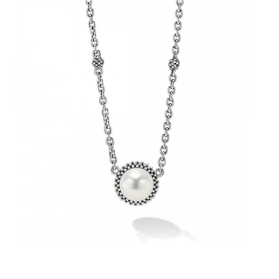 A modern necklace with freshwater culture pearl framed by sterling silver beading on a 16-18 inch adjustable necklace.- Sterling Silver- Lobster Clasp- Necklace adjustable 16 to 18 Inches- Pearl measures 8mm- STYLE #: 04-80576