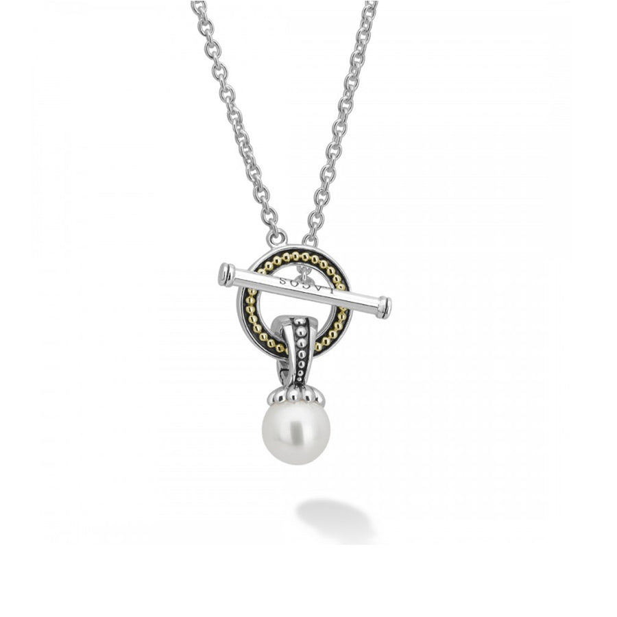 Freshwater cultured pearl toggle pendant necklace. The pearl pendant is removable for added versatility. Finished with 18K gold and sterling silver toggle clasp.- Sterling Silver & 18K Gold- Toggle Clasp- Dimensions 30mm x 15mm- Length 18 Inches- STYLE #: 04-81136-M18
