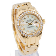 This beautiful Rolex Pearlmaster features a 29mm 18k yellow gold case & bracelet, a stunning mother-of-pearl dial with diamond markers and a diamond bezel. Powering this timepiece is Rolexs automatic movement which has a two-day power reserve. The watch came to our store as a trade and is in excellent condition. Please contact us if you have any questions about this amazing Rolex timepiece.This piece was sold in March 2019. If you are looking for something similar, please reach out to us!