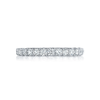A beautiful string of diamonds on a 2.5mm band with a Petite Crescent inner face.18K White Gold0.98ct total diamond weightPetite Crescent3/4 band