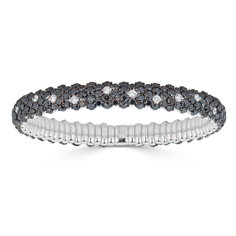 ZYDO ITALY has created a spring technology which allows their diamond bracelets and rings to be pulled, twisted, flexed and otherwise manipulated without breaking or losing their shape! In addition to the all diamond bracelet and rings, ZYDO has styles showcasing colored gemstones such as blue sapphire and pink sapphire. The bracelets and rings are also available in white, yellow or rose gold.  