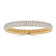 ZYDO ITALY has created a spring technology which allows their diamond bracelets and rings to be pulled, twisted, flexed and otherwise manipulated without breaking or losing their shape! In addition to the all diamond bracelet and rings, ZYDO has styles showcasing colored gemstones such as blue sapphire and pink sapphire. The bracelets and rings are also available in white, yellow or rose gold.  