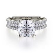 This immaculate Michael M engagement ring is displayed with a stunning round shaped center diamond (not included at time of purchase), and can fit an array of diamonds ranging in size from 1.40 carats to 1.60 carats.