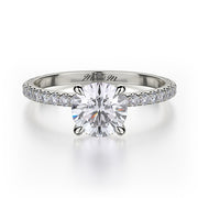 This immaculate Michael M engagement ring is displayed with a stunning round shaped center diamond (not included at time of purchase), and can fit an array of diamonds ranging in size from 0.90 carats to 1.10 carats.