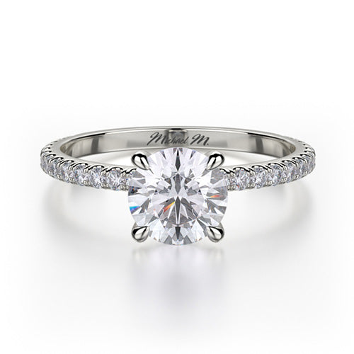 This immaculate Michael M engagement ring is displayed with a stunning round shaped center diamond (not included at time of purchase), and can fit an array of diamonds ranging in size from 0.90 carats to 1.10 carats.