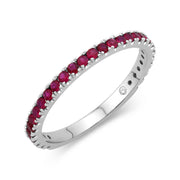 This ruby gemstone band is perfect for those with July birthdays. It is easily stackable and a fun way to add a pop of color! It is set in 14k white gold and has 29 stones totaling 0.54cts. 