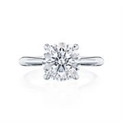 Say hello to this exceptionally beautiful solitaire engagement ring, designed by our Founder, Haig Tacorian. A stunning four-prong round solitaire engagement ring with an entirely new diamond-intense Tacori crescent signature.Diamond Carat Weight (not including center diamond): 0.16*Price varies depending on center stone carat weight.