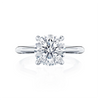 Say hello to this exceptionally beautiful solitaire engagement ring, designed by our Founder, Haig Tacorian. A stunning four-prong round solitaire engagement ring with an entirely new diamond-intense Tacori crescent signature.Diamond Carat Weight (not including center diamond): 0.16*Price varies depending on center stone carat weight.