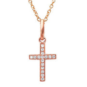 A great gift for a first communion or baptism! This 14K rose gold diamond cross necklace is the perfect everyday cross! 