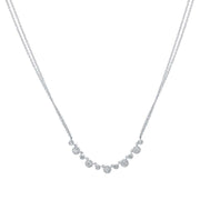 Several diamond drops come together at the base of this necklace to give it lots of sparkle! If youre wanting to stray from the classic diamond pendant, this is the way to go! 