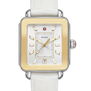 This two-tone Michele Deco Sport watch offers a sporty, more casual take on the classic Deco with white lum-filled stick indexes on a silver white sunray dial and a gold-tone reflector bezel. The white embossed silicone strap is interchangeable with any 18mm MICHELE watch.