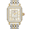 This two-tone Deco Madison offers a sleek take on the classic Deco with gold-plated Roman numeral indexes on the silver sunray dial and 155 diamonds covering the bezel and dial. The two-tone bracelet is interchangeable with any 18mm MICHELE strap.