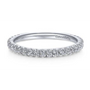 Shimmering diamonds wrap three-quarters of the way around this pristine 14K white gold stackable ring. Impress in any situation with this classic 0.42ct diamond stackable ring.