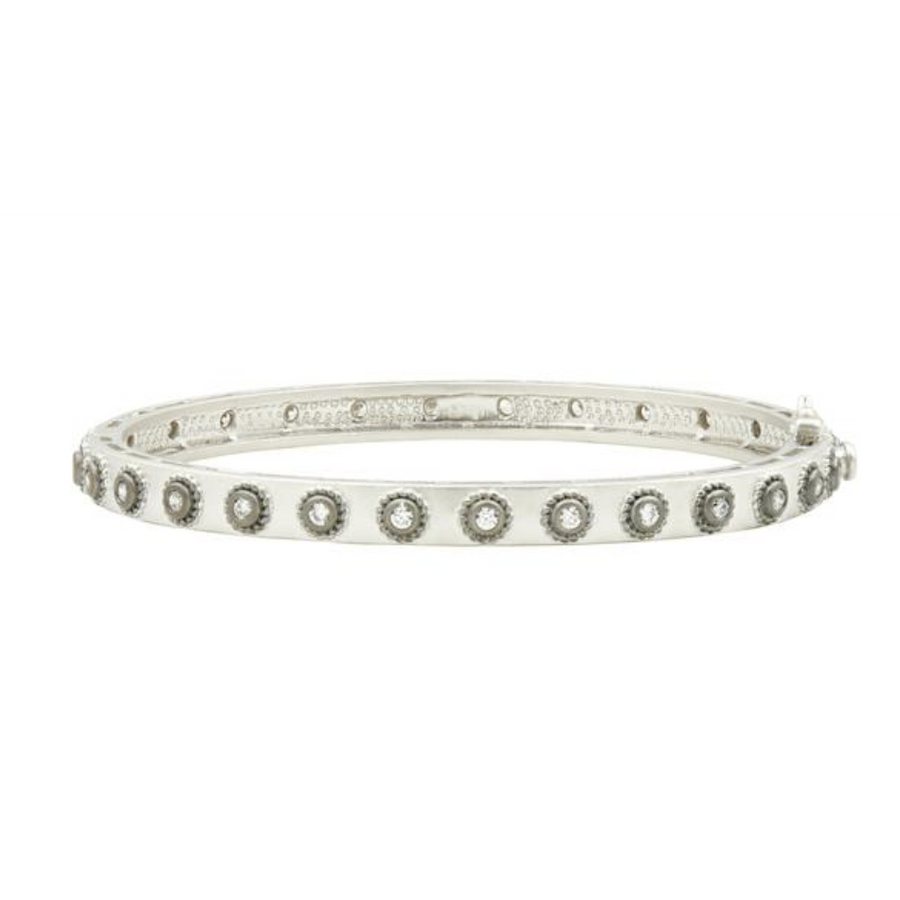If you were to ask us what is the must-have bangle- this would be the one! The signature studded bangle is the perfect bangle to #StartYourStack and it looks fabulous worn alone as well! We love this one so much we have it in many color ways - the more you add the better the stack looks, your arms the limit as how high you can go!!!!