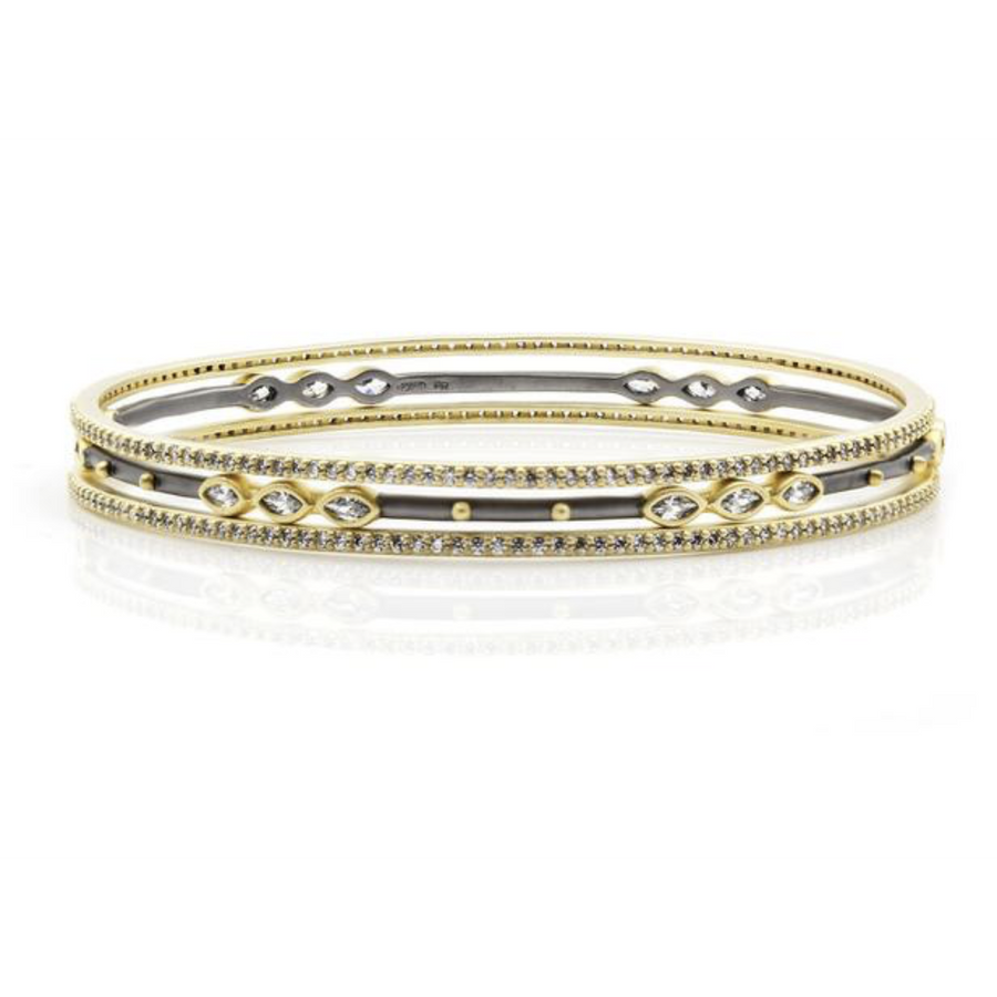 If youre looking for an easy 3-stack bangle that has a stunning amount of sparkle, its the Signature Marquise Station 3-Stack Bangle.  I love throwing this stack on in the morning for the day or pairing it with a cocktail dress for an evening event.  Mixing both color variations together create an extra pop on your arm.
